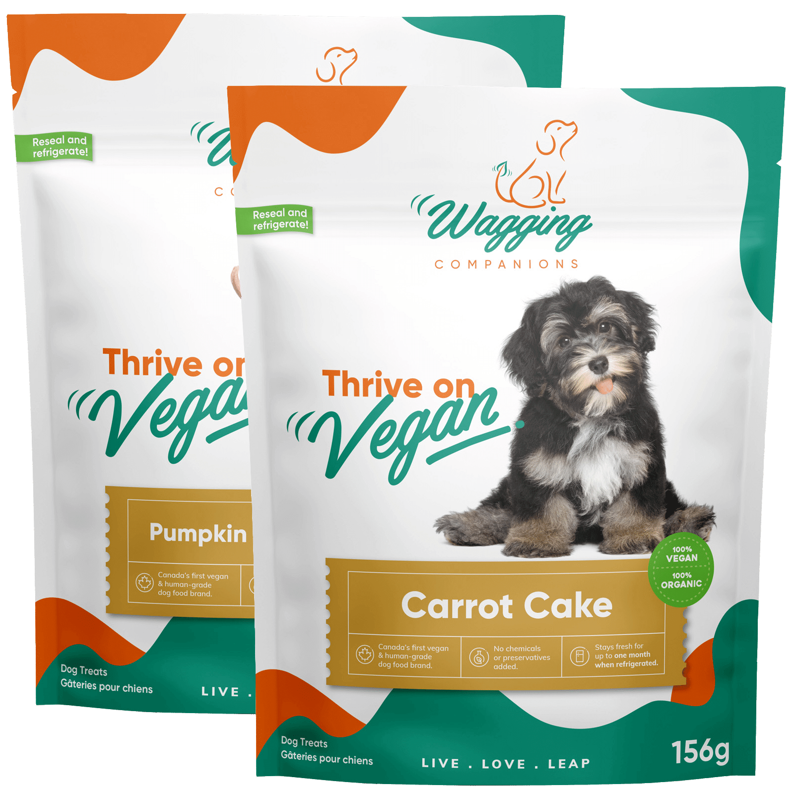 Front view of Wagging Companions' pumpkin spice oatmeal and carrot cake treats packaging. The simple yet visually appealing packaging prominently displays the message 'Thrive on Vegan.' The treats invite mixing-and-matching any 2 flavors, offering a cost-saving option for pet owners seeking quality vegan treats.
